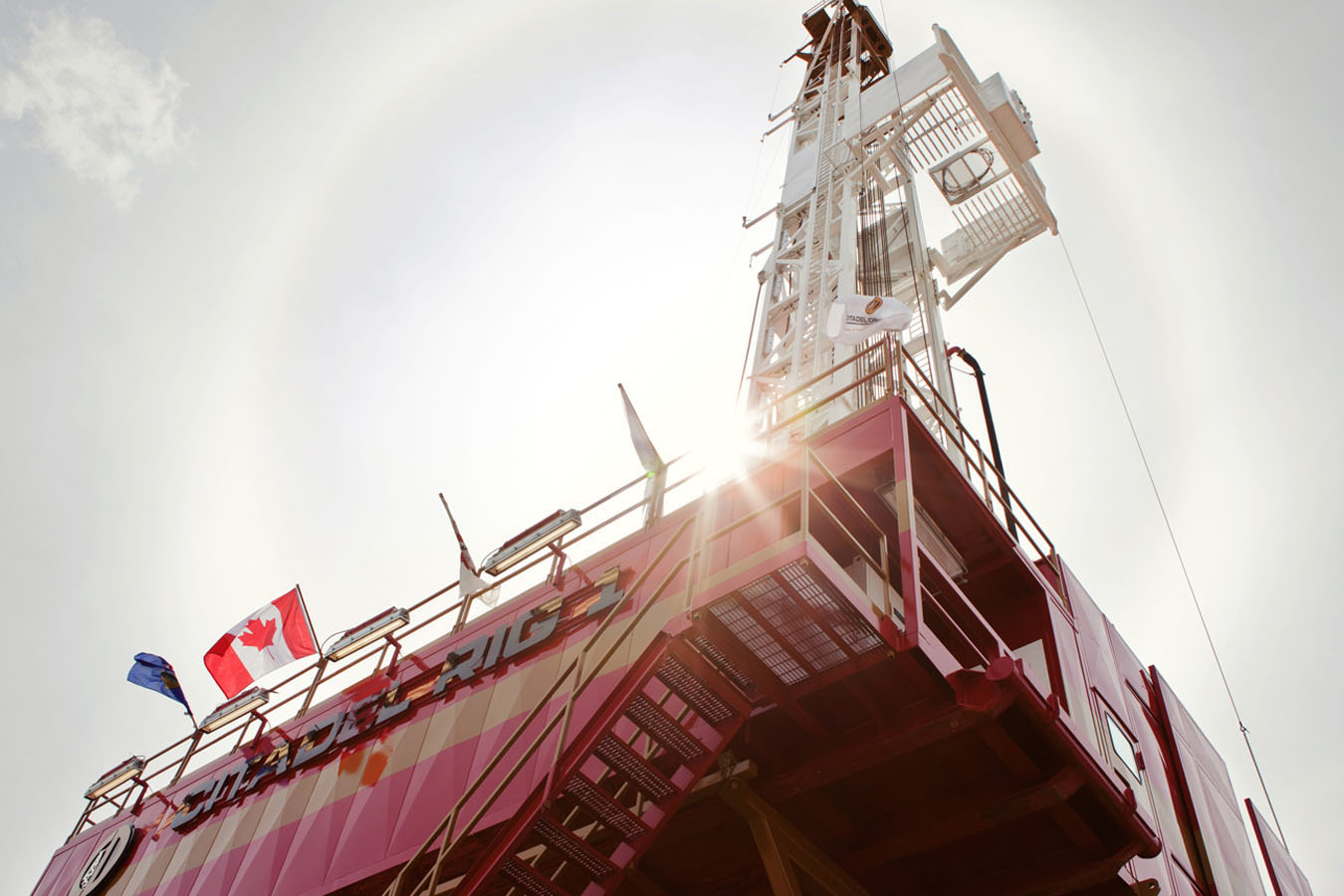 A high angle view of a crane with a Canadian flag